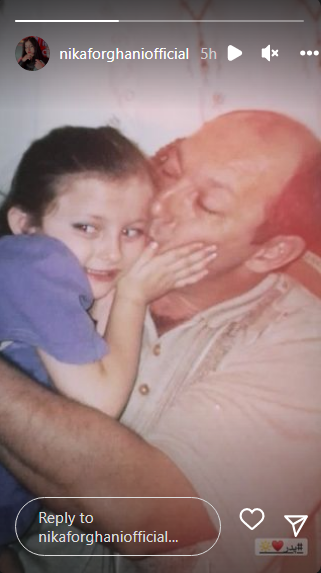 عکس کودکی نیکا فرقانی در آغوش پدرش