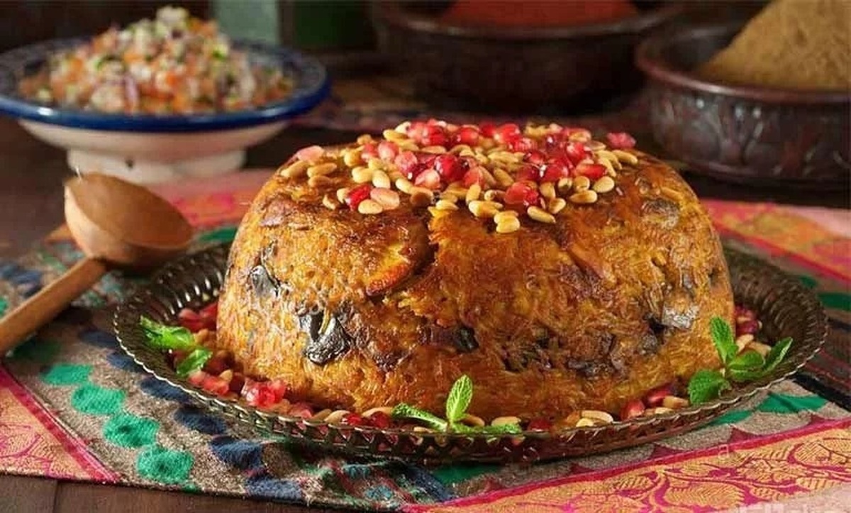 ۱۱ مرحله برای درست کردن یک ته چین مرغ و بادمجان خوشمره