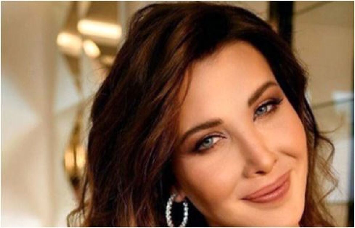 قابی خانوادگی از نانسی عجرم کنار همسر و دخترش در یک جشن تولد لاکچری