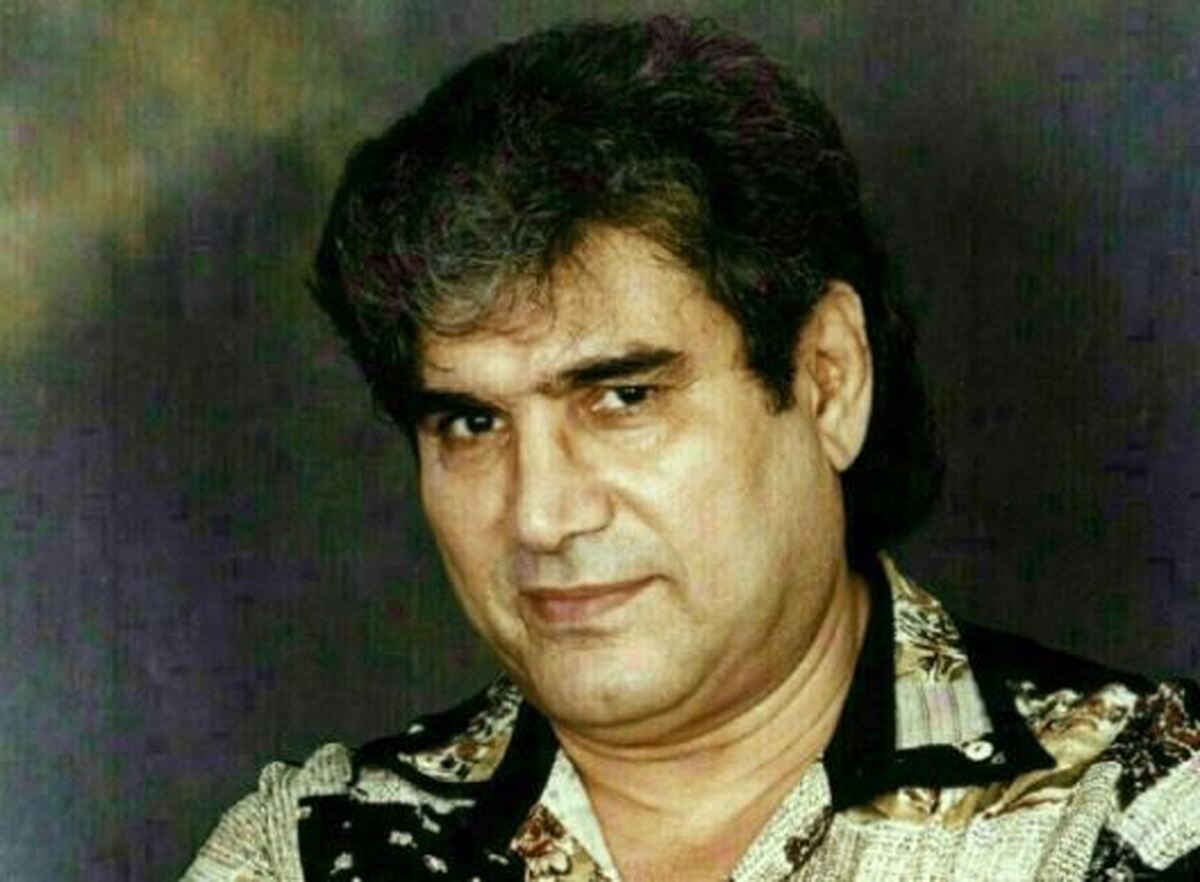 تصویری نایاب از نعمت الله آغاسی در حال بچه داری که وایرال شد+عکس