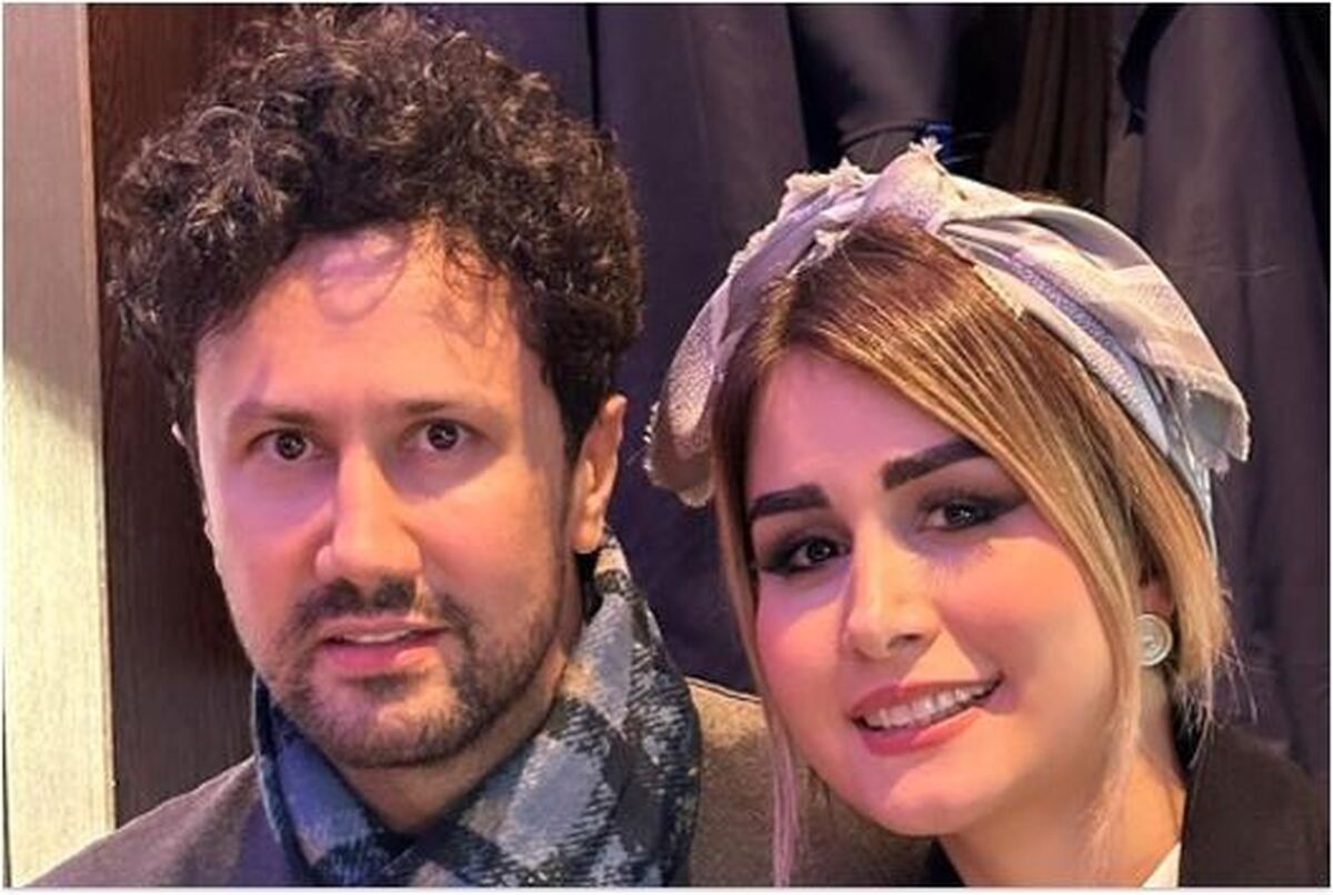 سلفی آیینه‌ای شاهرخ استخری و همسر جوانش در یک مرکز خرید لوکس و گران قیمت