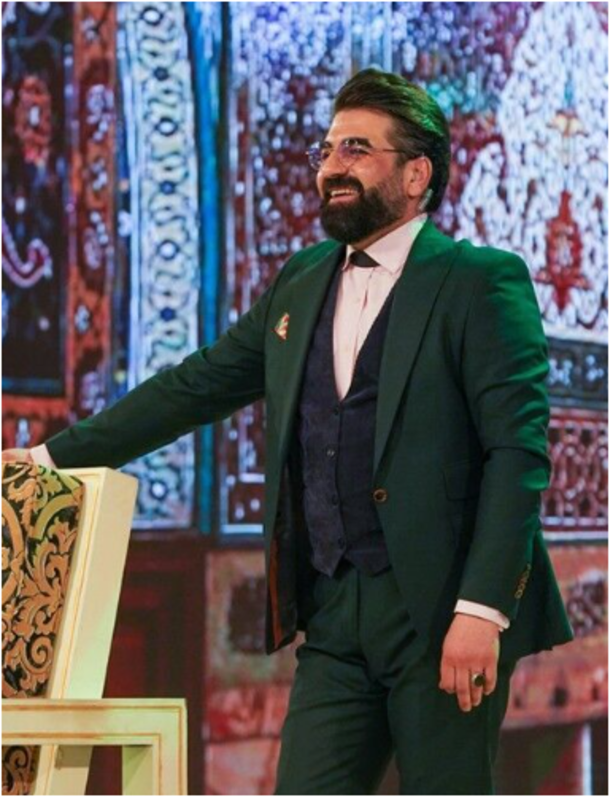 عکس پدر پسری رسالت بوذری با کلاه عرقچین!