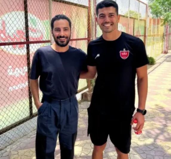 عکس مربی پرسپولیس با نوید محمدزاده استقلالی سر و صدا به پا کرد!