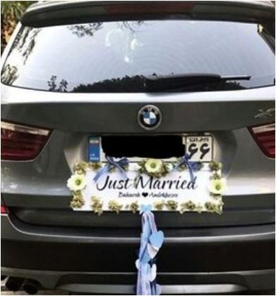 نگاهی به ماشین عروس BMW بهاره رهنما و امیرخسرو عباسی با تِم آبی +عکس / علاقه خانوم بازیگر به رنگ آبی روشن