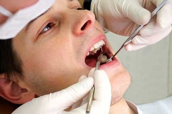 چرا لثه ام سیاه شده؟