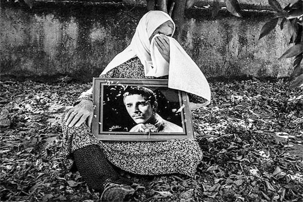 مادر شهید حسن احمدی به فرزند شهیدش پیوست