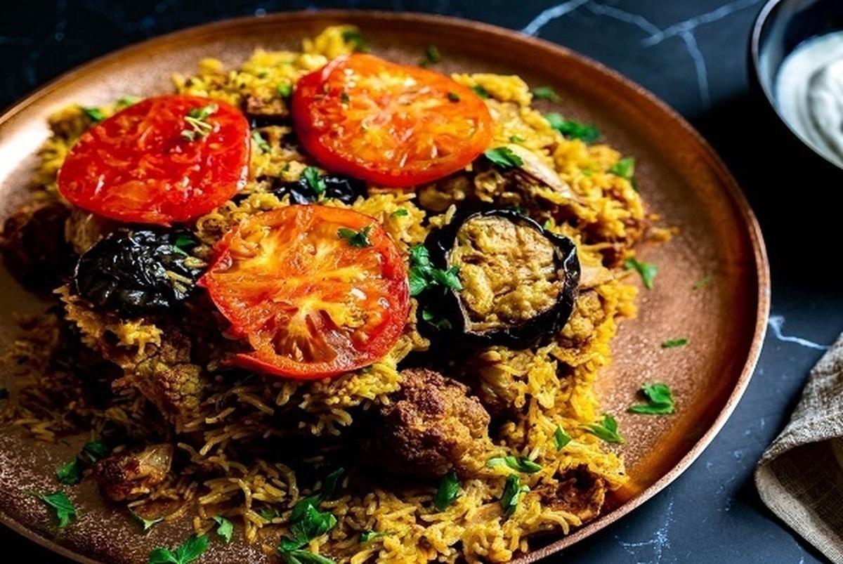 به سبک قزوینی ها این بادمجان پلوی  محشر با گوشت چرخی آماده کنید