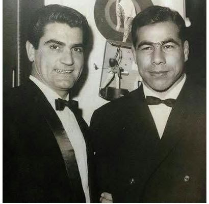 عکس قبل انقلابی از خواننده معروف در کنار جهان پهلوان تختی