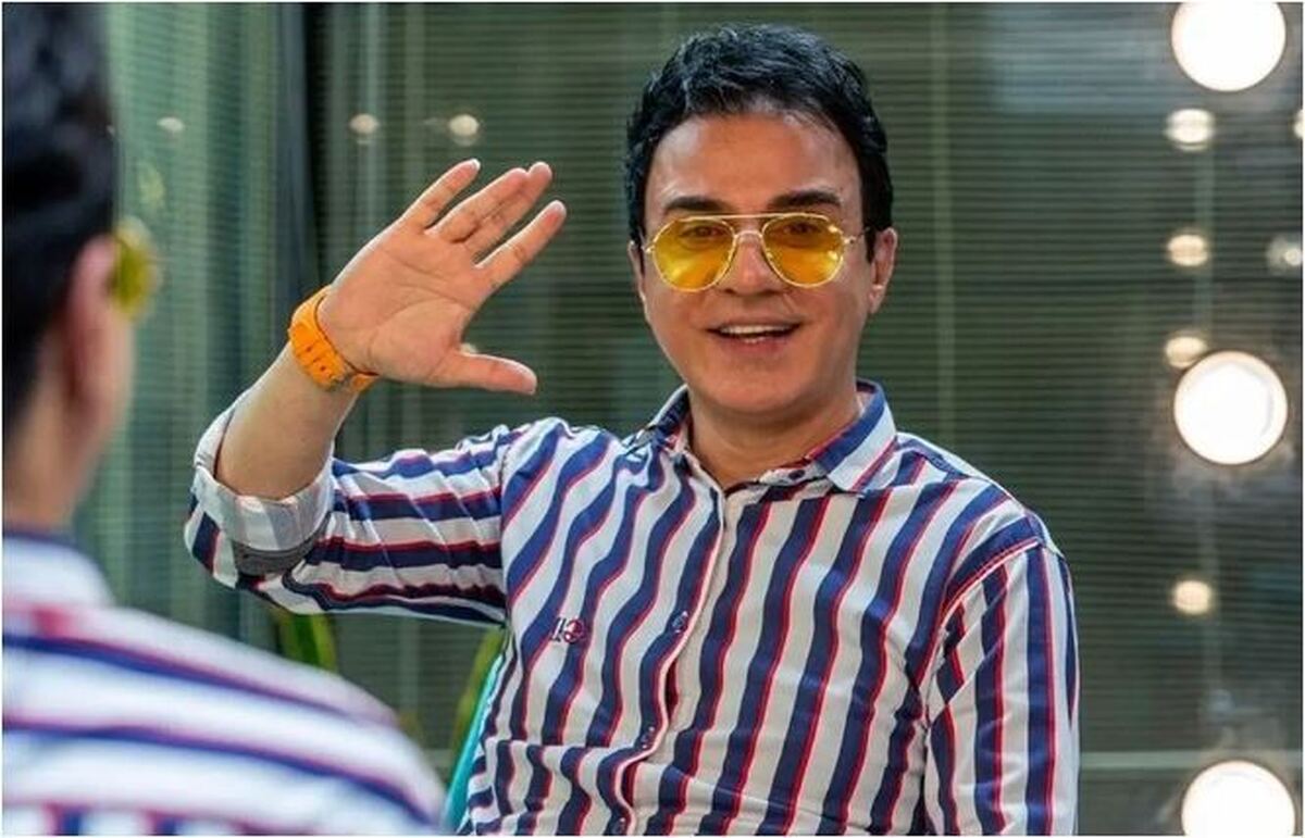 عکس یادگاری پر بازدید از عمو پورنگ با چهره بشاش کنار ستاره پیشکسوت سینما