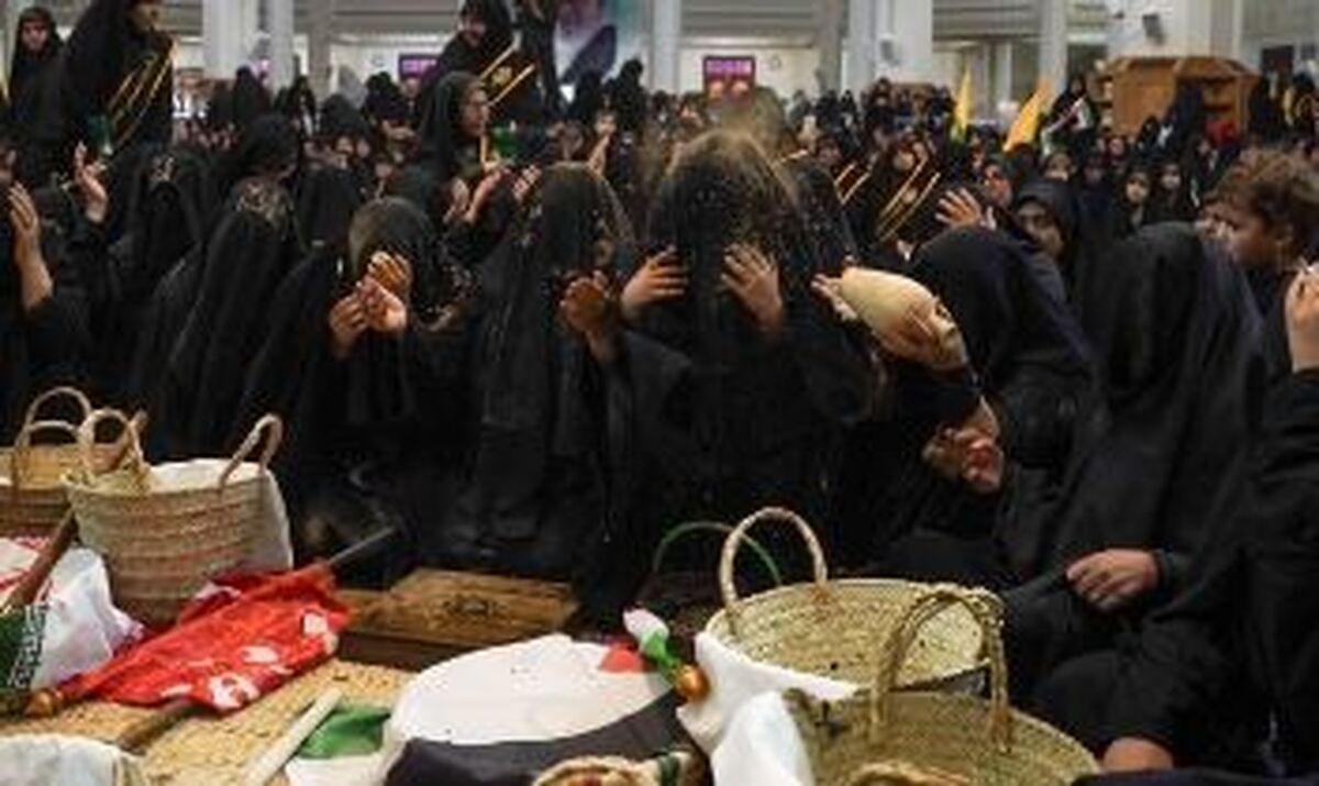 تشییع نمادین پیکر پاک شهدای کربلا در حرم شاهچراغ (ع)