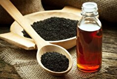 رفع مشکلات دستگاه گوارش با مالیدن روغن سیاه دانه به شکم