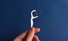 نخ دندان کشیدن خطر سکته مغزی را کاهش می‌دهد