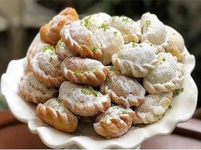 صفر تا صد تهیه قطاب کرمانی؛ یکی از شیرینیهای سنتی ایران صفر تا صد تهیه قطاب کرمانی؛ یکی از شیرینیهای سنتی ایران